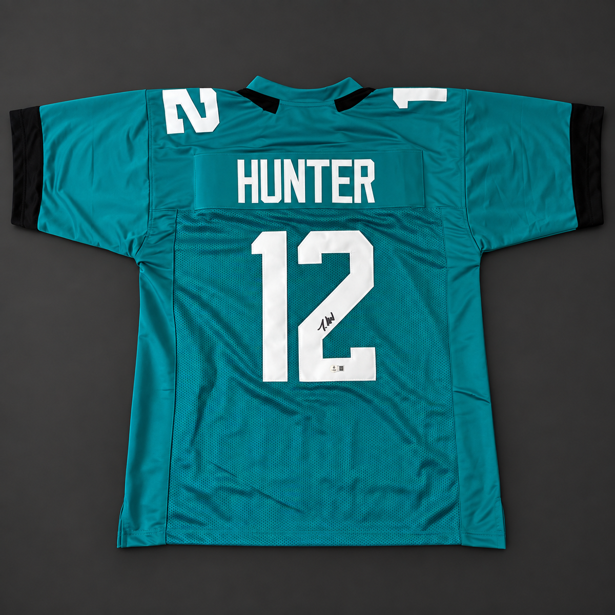 Travis Hunter Signed Jacksonville Teal Football Jersey (Beckett)