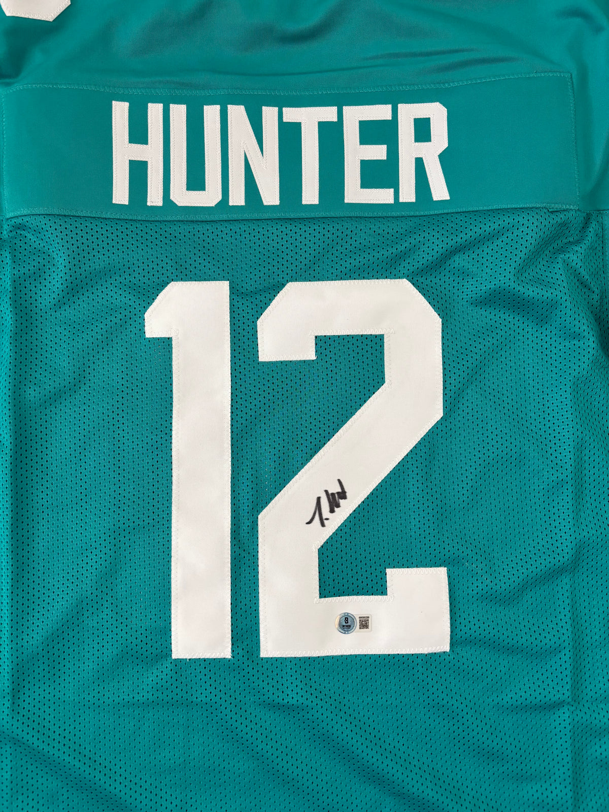 Travis Hunter Signed Jacksonville Teal Football Jersey (Beckett)